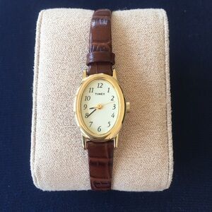 Timex Ladies Gold Oval Watch with Brown Leather Strap